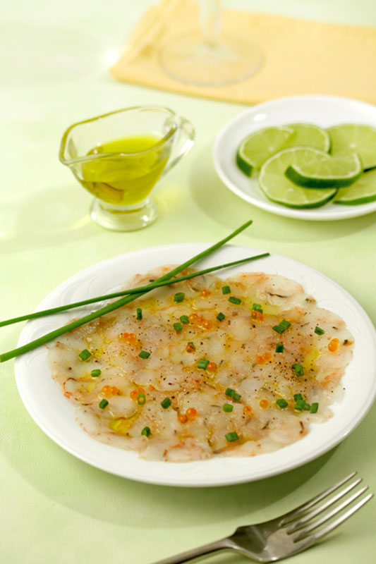 Receptes per cuinar: Carpaccio de bacallà sobre tomàquet amb oli d’oliva verge extra Spelunca Espluga Calba DO Garrigues